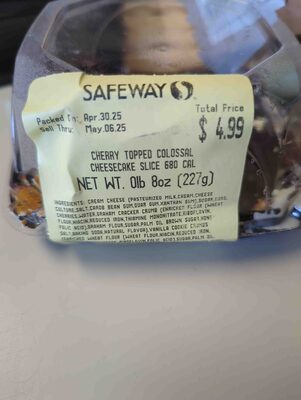 Cherry Topped Colossal Cheesecake Slice