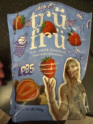 Frozen strawberries milk and white chocolate covered