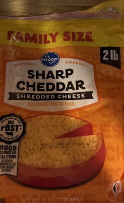 Shredded sharp cheddar cheese