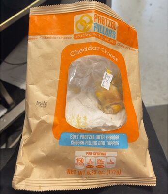 Soft pretzel with cheddar cheese filling and topping